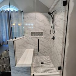 TRC Home Improvements - Removed the tiny fiberglass shower insert and custom built a walk in shower with an oversized bench seat and custom made shower glass & door