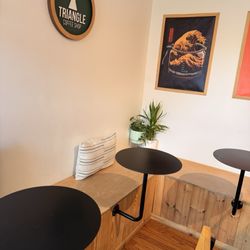 Triangle coffee shop - Right inside of the shop, front seating area