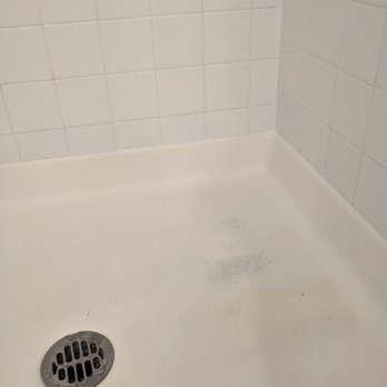 TubPros - 20 year old fiberglass shower pan showing it's age and wear. - Refinishing Services Near Me - Menifee, California TubPros - 20 year old fiberglass shower pan showing it's age and wear. - Refinishing Services Near Me - Menifee, California