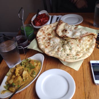 Cedars in University District - Vegetable coconut curry, garlic naan, butter chicken - Indian Near Me - Seattle, Washington