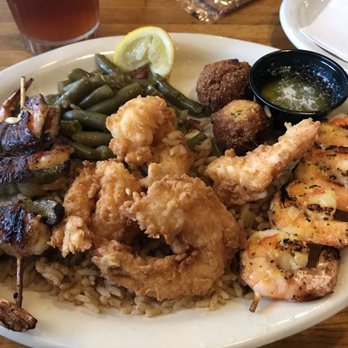 Clear Springs Restaurant - Yummy! Shrimp Trio (fried shrimp, grilled shrimp & shrimp brochette) over Cajun rice with green beans and hush puppies - Seafood Near Me - Tyler, Texas Clear Springs Restaurant - Yummy! Shrimp Trio (fried shrimp, grilled shrimp & shrimp brochette) over Cajun rice with green beans and hush puppies - Seafood Near Me - Tyler, Texas