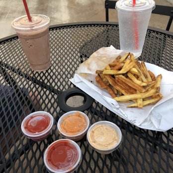 Hate Burger - Chocolate shake with fries! Sauces are ketchup and the hate sauce so spicy but so good - Burgers Near Me - Redlands, California Hate Burger - Chocolate shake with fries! Sauces are ketchup and the hate sauce so spicy but so good - Burgers Near Me - Redlands, California