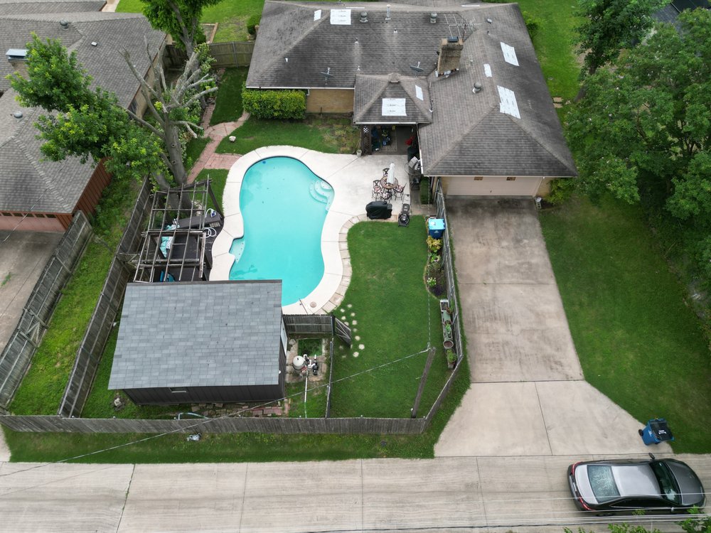 Slide of Taylored Roofing