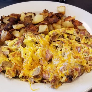 Jamie's Cafe - Meat & Cheese Scramble. Bacon, ham, and sausage, loads of cheese, and 3 eggs. By the way, the breakfast potatoes were great too! - Cafes Near Me - Elk Grove, California