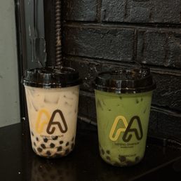 Black Fresh Milk Tea (left) and Jasmine Matcha Boba Latte (right) Black Fresh Milk Tea (left) and Jasmine Matcha Boba Latte (right)