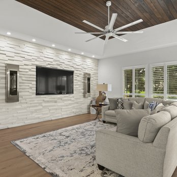Rainier - a living room with a ceiling fan - General Contractors Near Me - Jacksonville, Florida Rainier - a living room with a ceiling fan - General Contractors Near Me - Jacksonville, Florida