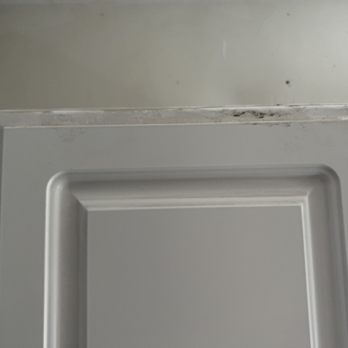 Klappenberger & Son - White kitchen cabinets that the workers left dirty. - Painters Near Me - Severna Park, Maryland