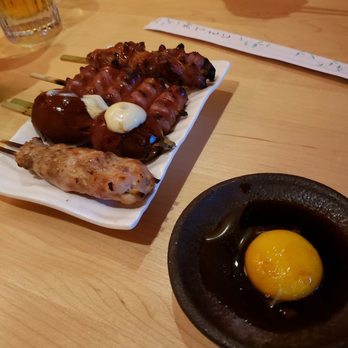Bar Oni Izakaya - Dipping sauce, sausage, truffle mayo eggs, assorted chicken skewers - Japanese Near Me - Cleveland, Ohio