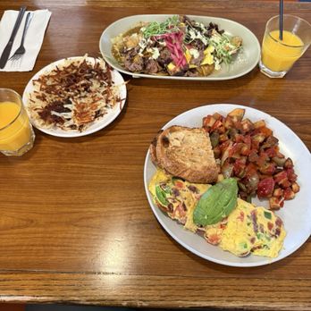 Dick Church's - Omelette with breakfast potatoes and toast - chilaquiles with side of hash browns (extra crispy) - 2 orange juices (freshly squeezed!!) - Diners Near Me - Costa Mesa, California