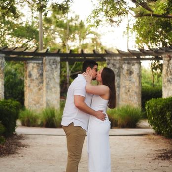 Ingraham Park - Female in white dress, male in white shirt & tan pants. They are kissing in the middle of the photo in front of columns. - Parks Near Me - Coral Gables, Florida Ingraham Park - Female in white dress, male in white shirt & tan pants. They are kissing in the middle of the photo in front of columns. - Parks Near Me - Coral Gables, Florida