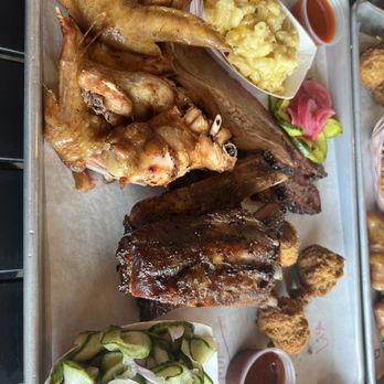 Smokehouse at Steve’s - Ribs, brisket w/pickled veggies, wings, macaroni and cheese, and cucumber salad - Barbeque Near Me - Graham, North Carolina Smokehouse at Steve’s - Ribs, brisket w/pickled veggies, wings, macaroni and cheese, and cucumber salad - Barbeque Near Me - Graham, North Carolina