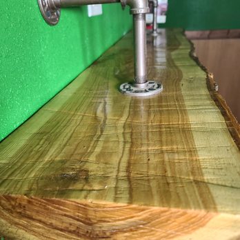 Building From The Ground Up - a faucet on a wooden counter - Handyman Near Me - Victorville, California Building From The Ground Up - a faucet on a wooden counter - Handyman Near Me - Victorville, California