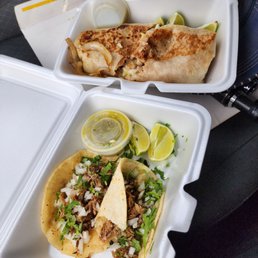 Shredded Beef tacos and a rice and beans burrito with essence of shredded beef. Shredded Beef tacos and a rice and beans burrito with essence of shredded beef.