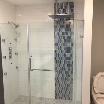 Handyman In A Snap - a bathroom with a toilet and shower - Handyman Near Me Handyman In A Snap - a bathroom with a toilet and shower - Handyman Near Me