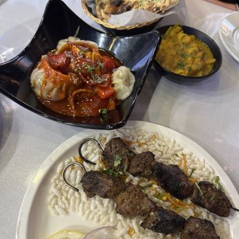 Timur House - Leavened Bread (Garlic) Chicken Steam Chili Momo Mutton Skewer - Himalayan/Nepalese Near Me - New York, New York Timur House - Leavened Bread (Garlic) Chicken Steam Chili Momo Mutton Skewer - Himalayan/Nepalese Near Me - New York, New York