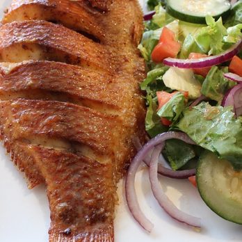 Okapi Bistro - Red tilapia - African Near Me - Bloomingdale, Illinois Okapi Bistro - Red tilapia - African Near Me - Bloomingdale, Illinois