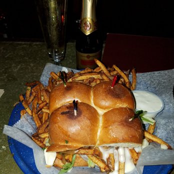 The Long Room - The Poutinewich - short rib meat, fries, short rib gravy, curd cheese sauce, onion jam, and arugula - Bars Near Me - Chicago, Illinois