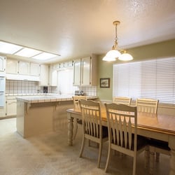 KitchenBOX featuring Giallo Ornamentale granite, Bedrosian's 3 x 6 Vera Cruz Sand travertine tiles for the backsplash.