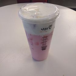 Starbucks - Strawberry milkshake with (I'm not too sure) cold foam or cream on top