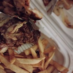 P & H Truck Stop - This is a raw burger that was supposed to be well done and with no onions and you clearly see only onions as a topping.