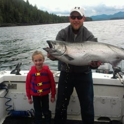 Alaskan Dream Sportfishing - Kit (Owner & Operator) with his daughter and a huge King Salmon