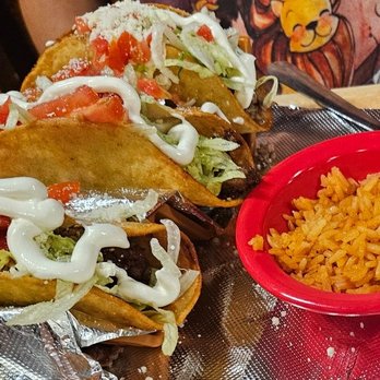 El Lago - This is taco meal missing the other rice. Small portion of rice - Mexican Near Me - Branson West, Missouri