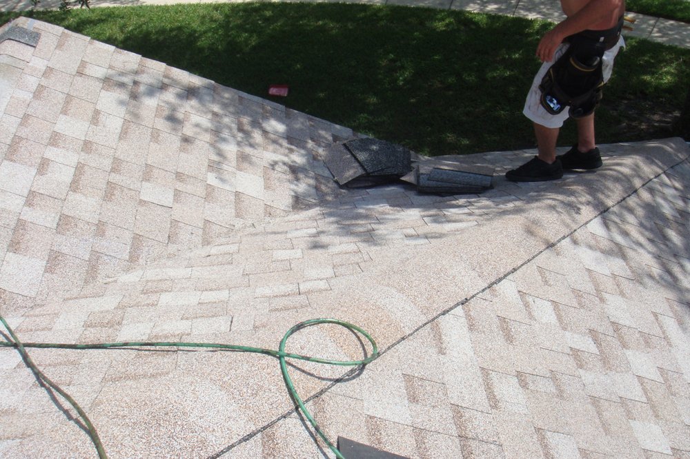 Slide of Rizzo Roofing