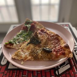Tony and Nello's - Eggplant carmelized onion pizza and prosciutto & basil pizza