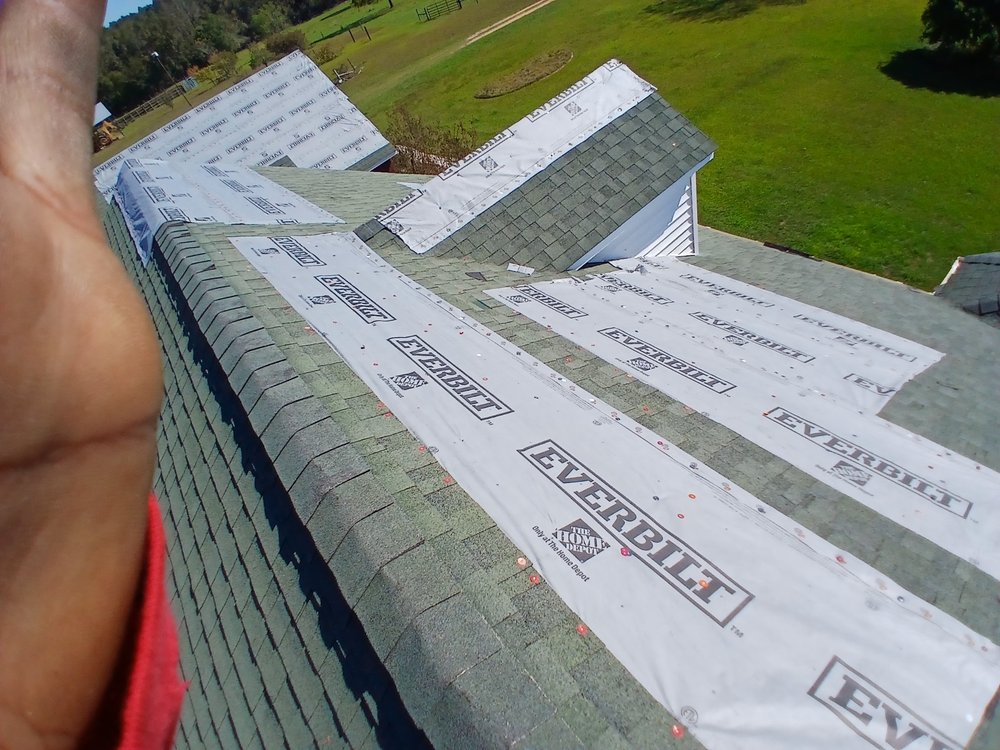 Slide of RCM Roofers