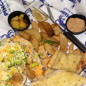 Pinchers - fried shrimp tacos with lettuce, chipotle aioli and shredded cheese. paired w/ a side of steak fries, garlic bread, and mango salsa, yum - Seafood Near Me - Marco Island, Florida