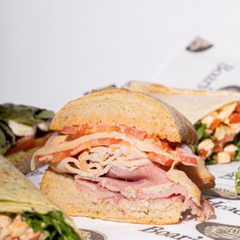 Candela Y Cafe - a sandwich cut in half - Coffee & Tea Near Me - Miami, Florida Candela Y Cafe - a sandwich cut in half - Coffee & Tea Near Me - Miami, Florida