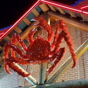 Storming Crab - a large red crab hanging from the roof of a restaurant - Cajun/Creole Near Me - Youngstown, Ohio