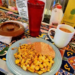 Lozano's Mexican Restaurant - Scrambled eggs with chorizo, refried beans, fresh cubed potatoes, corn tortillas and coffee