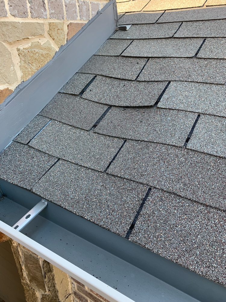 Slide of Dan's Roofing Inc