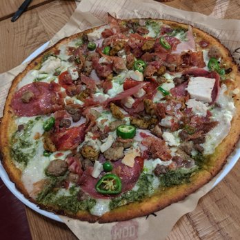 MOD Pizza - Cauliflower crust Domino's white sauce for pasta and every meat that have in the house topped with Serrano peppers - Fast Food Near Me - Conroe, Texas
