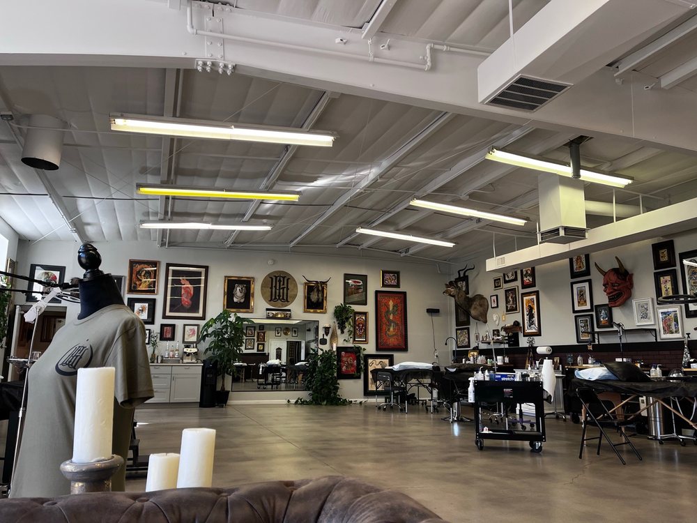 Wolf and Goat Tattoo Logo