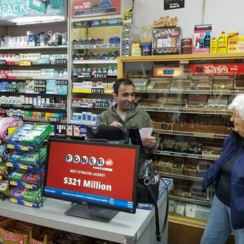 Handy Liquor - Sonny laughs with a customer - Convenience Stores Near Me - Belmont, Massachusetts