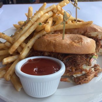 Moss Beach Distillery - Pulled pork sandwich and garlic fries - Seafood Near Me - Moss Beach, California