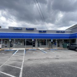 Atlantic Barbershop - Blue awning