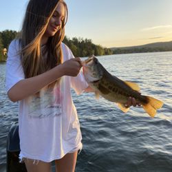 Hooked Up Guiding Service - Eden's first bass!! Not a bad one either!