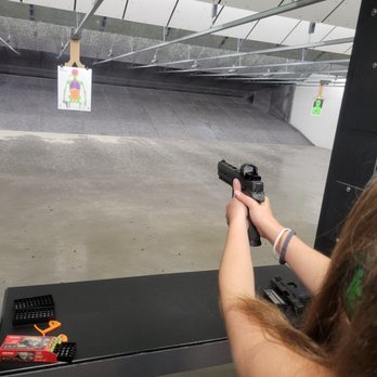 FrogBones Family Shooting Center - Summer daughter with the SigSauer P320 XFive Legion. - Guns & Ammo Near Me - Melbourne, Florida FrogBones Family Shooting Center - Summer daughter with the SigSauer P320 XFive Legion. - Guns & Ammo Near Me - Melbourne, Florida