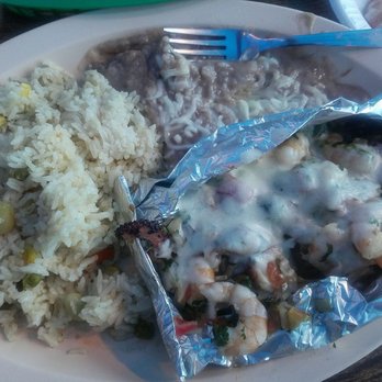 La Palapa - Fish stuffed with shrimp, crab meat, and grilled squid. Perfection. Creamy refried beans and rice & beans as sides. Huge portions. - Seafood Near Me - Chicago, Illinois