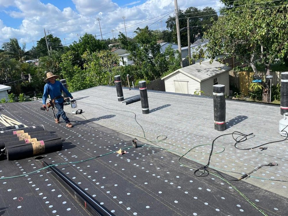 Slide of Kingsman Roofing