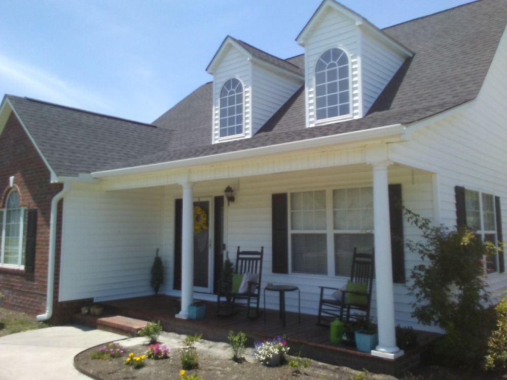 Slide of Zack's Seamless Gutters And More