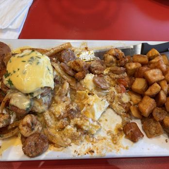 The Egg Bistro - Sandbridge Jumbo shrimp, bacon, spinach,  tomatoes, garlic and mozzarella  cheese, topped with hollandaise  sauce. - Breakfast & Brunch Near Me - Chesapeake, Virginia
