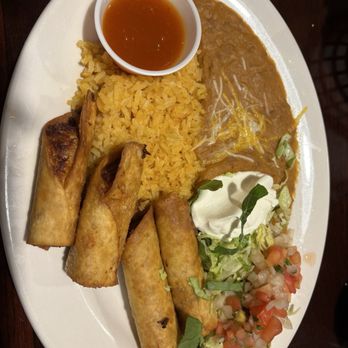 Don Juan's Restaurant - Lunch portion of chicken flautas with delicious red pepper jelly - Mexican Near Me - Jacksonville, Florida Don Juan's Restaurant - Lunch portion of chicken flautas with delicious red pepper jelly - Mexican Near Me - Jacksonville, Florida