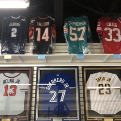 What’s Hot Cards & Collectibles - Framed and unframed autographed jerseys