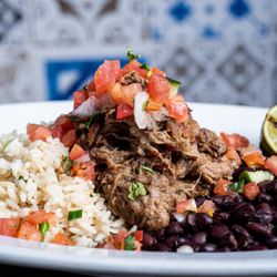 Paladar Latin Kitchen & 610 SOCIAL Bar + Lounge - Rum Glazed Cuban Pork