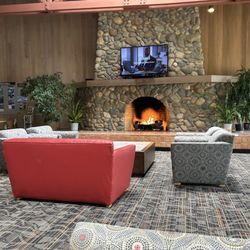 Gold River Sports Club - Common area with fireplace and couches