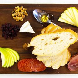 Scotty's Pub on the Bay - Charcuterie Board - Salami, Pepperoni, Prosciutto, Brie, Irish Cheddar, and Blue Cheese w/Fruits, Nuts, Honey, Biscoff, and Crostini's